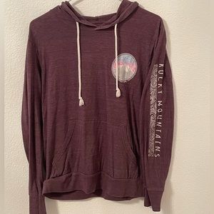 This is a purple hoodie with Keystone Colorado pictures on the front and back